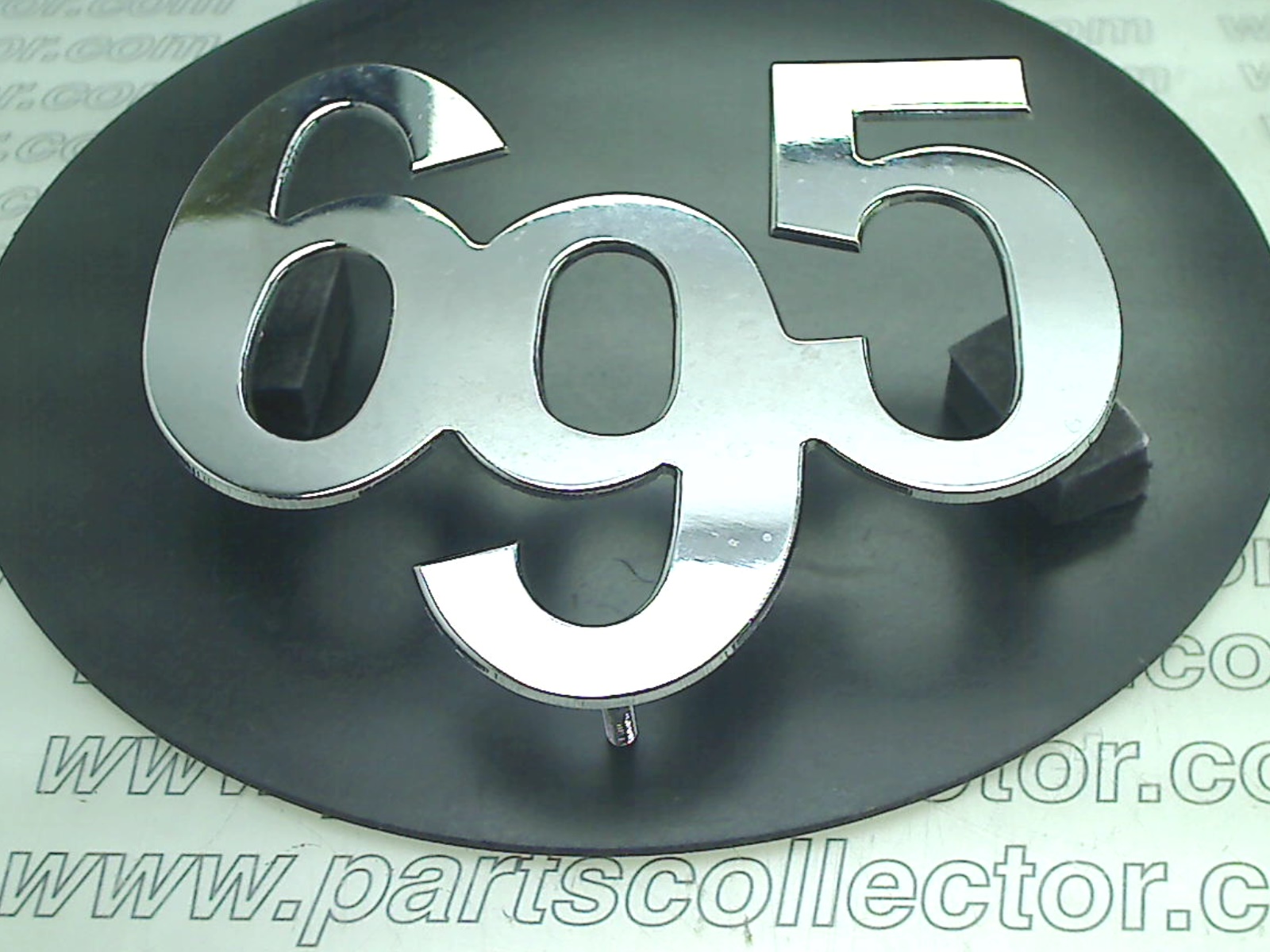 695 EMBLEM